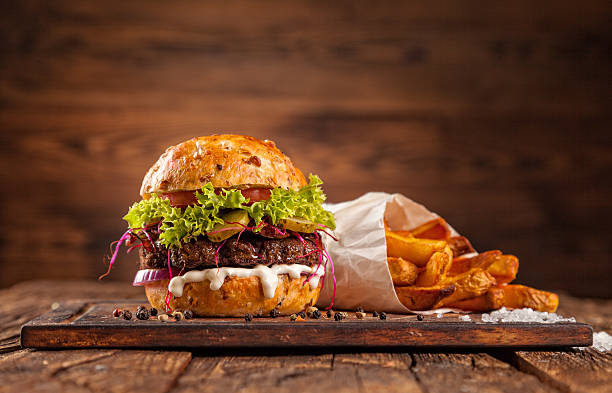 istock Delicious hamburger on wood 495519980