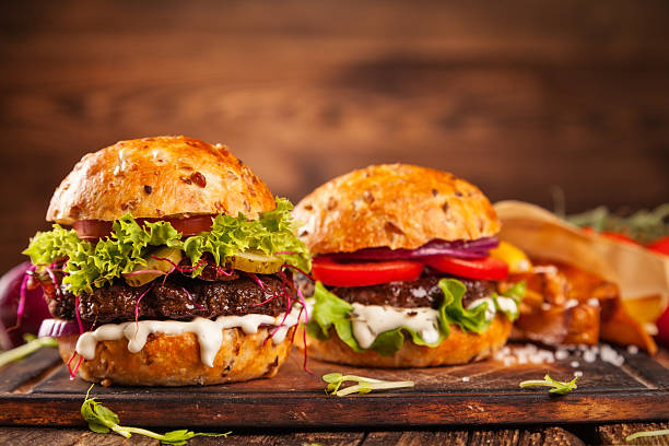 istock Delicious hamburger on wood 495520042