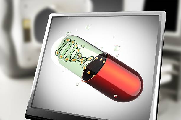 istock Transparent capsule on monitor in laboratory 495520250
