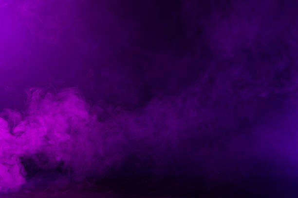 istock Swirling Pink and Purple Smoke on Black Background 495520486