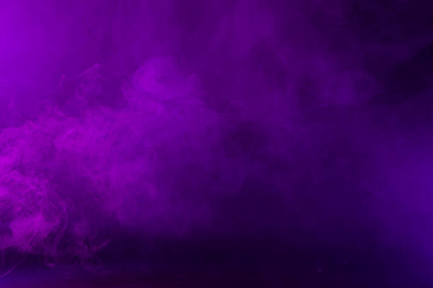 istock Swirling Pink and Purple Smoke on Black Background 495521392