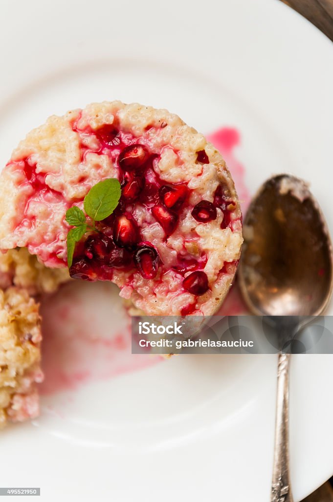 Rice pudding Rice pudding with pomegranate sauce 2015 Stock Photo