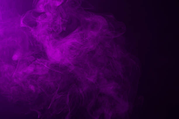 istock Swirling Pink and Purple Smoke on Black Background 495522032