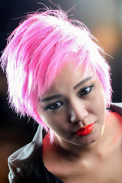 istock Portrait a pretty young pink hair 495524918