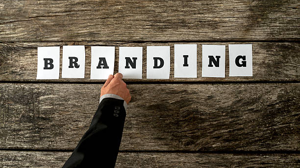 istock Top view of businessman assembling the word Branding 495534406
