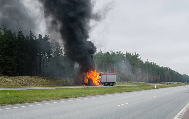 istock Burning truck on the road 495537154