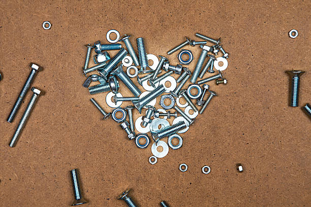 istock Bright heart from bolts and nuts 495537436