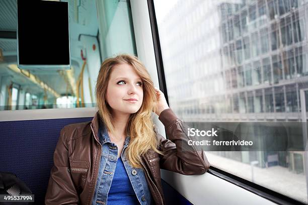 Woman Looking Out Metros Window Stock Photo - Download Image Now - Denmark, Train - Vehicle, Public Transportation