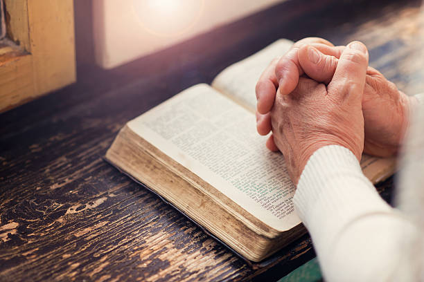istock Woman with bible 495538168