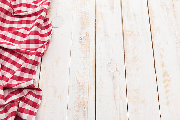 istock Towel over wooden kitchen table 495538940