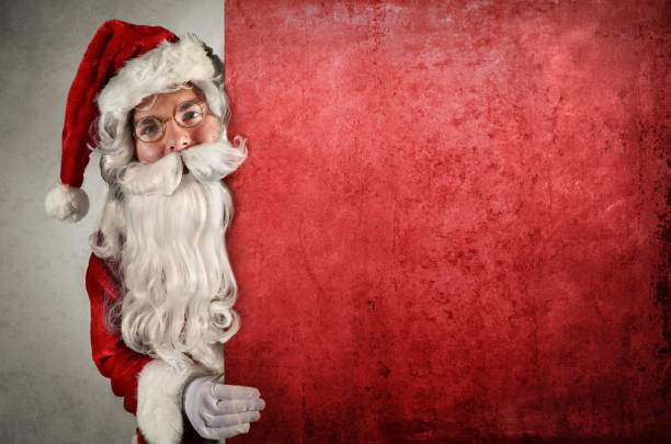 istock Santa Claus Showing Behind Of Billboard 495539252