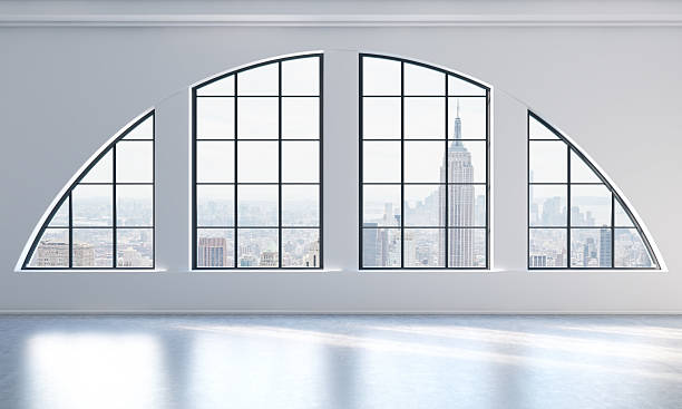 istock modern bright and clean loft interior. New York city view. 495539736