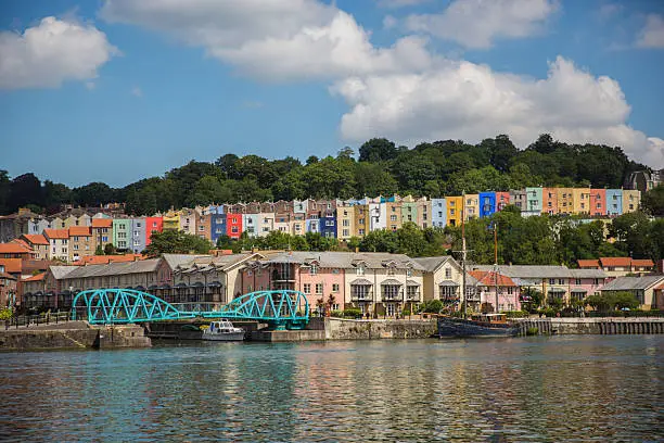 A view of Hotwell's colourful houses looking across Bristol Harbourside from Spike Island on a Summer's day