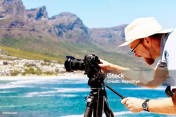 Photographer Setting Up Shot Of Camps Bay Beach Cape Town Stock Photo - Download Image Now