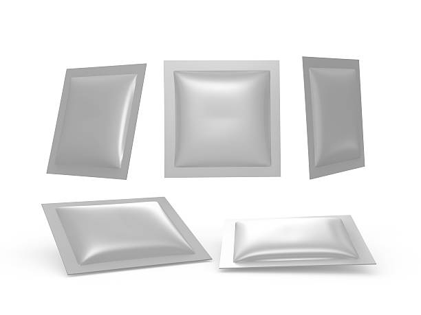 Square silver  foil heat sealed packet with clipping path stock photo