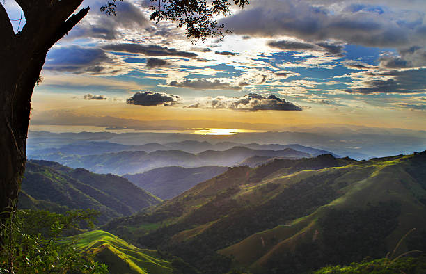 Monteverde Costa RIca Landscape towards Pacific Ocean Monteverde Costa RIca Landscape looking towards Pacific Ocean, 2012, at sunset costa rican sunset stock pictures, royalty-free photos & images