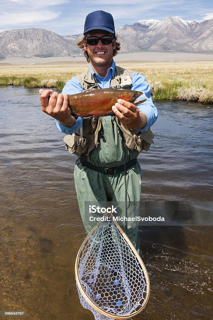 Fly Fisherman - Photo de Truite tueuse libre de droits