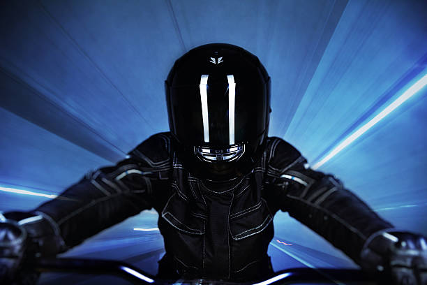 the biker wearing a black helmet