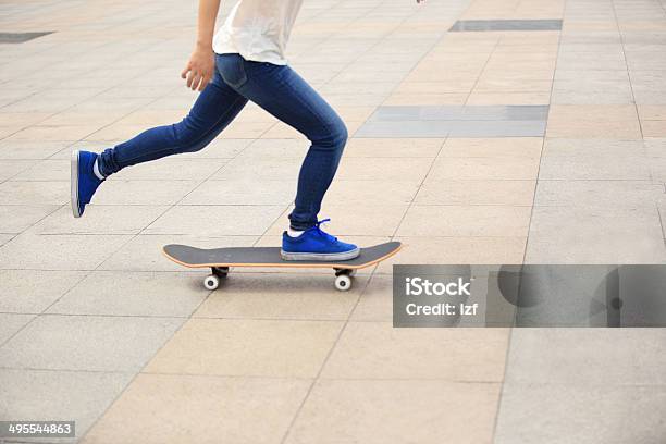 Speeding Skateboarding Woman Stock Photo - Download Image Now - Activity, Adult, Adults Only