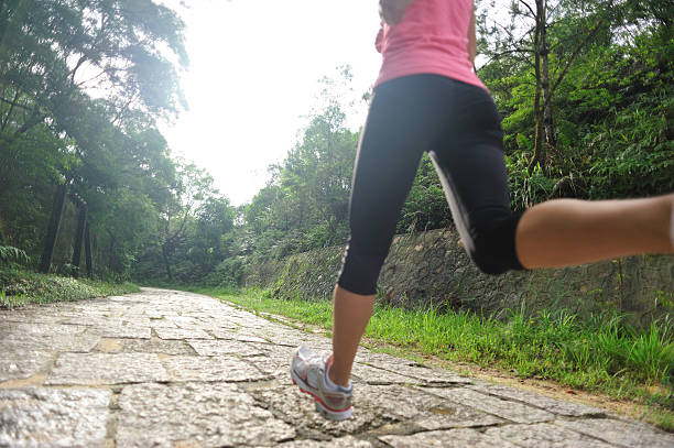 istock Runner athlete running on mountain trail. 495544881
