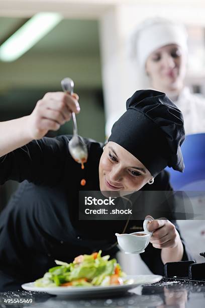 Chef Preparing Meal Stock Photo - Download Image Now - Adult, Business, Cap - Hat