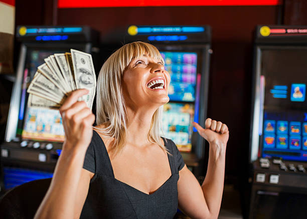 istock Happy woman in a casino. 495545823