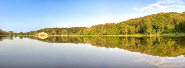 istock Reflection on artificial lake at Herneacova, Romania 495547697