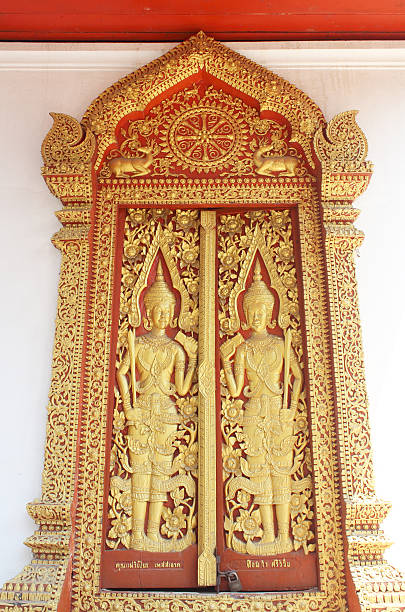istock Thai temple door sculpture 495548107