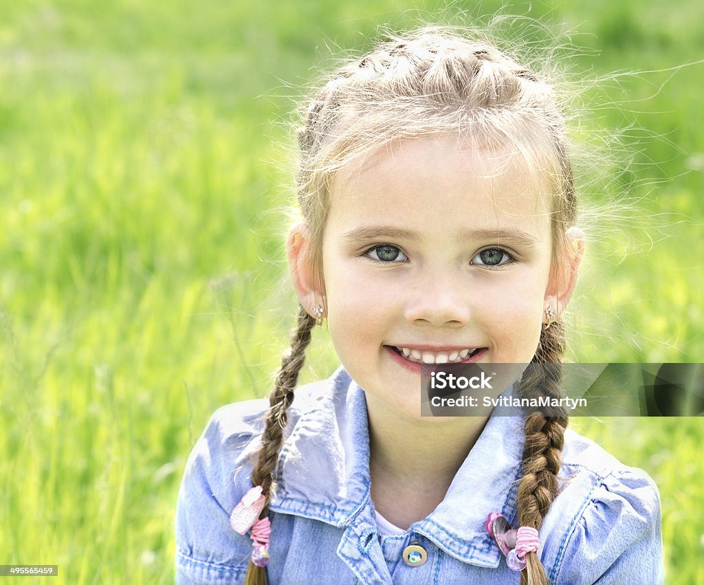 Portrait of adorable smiling little girl Portrait of adorable smiling little girl outdoor Child Stock Photo