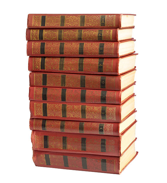 istock stack of old books with gold stamping on  white background 495566671
