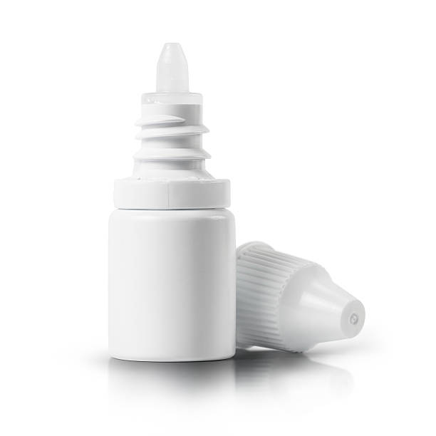 Dropper bottle of drug Bottle of fluid drug dropper isolated on white eyedropper stock pictures, royalty-free photos & images