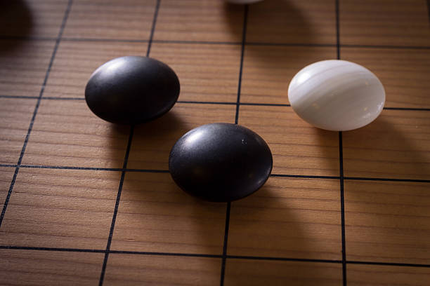 istock closeup of stones on a Go board 495567905