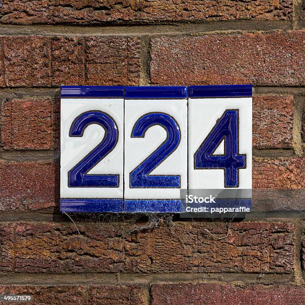 Number 224 Stock Photo - Download Image Now - Blue, Brick, Brick Wall