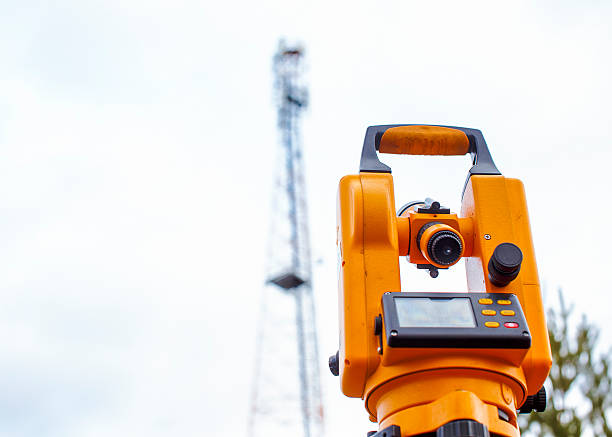 istock monitoring of telecommunication tower with a theodolite 495573558
