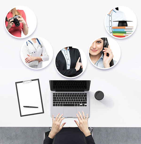 Top view of the working place with woman's hands.
