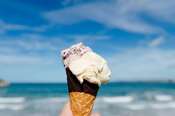 istock Large Ice Cream Cone Overlooking Newquay Bay 495576560