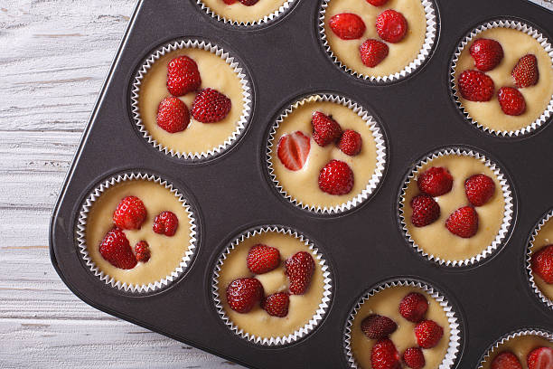istock cooking strawberry muffins in baking dish top view horizontal 495577834