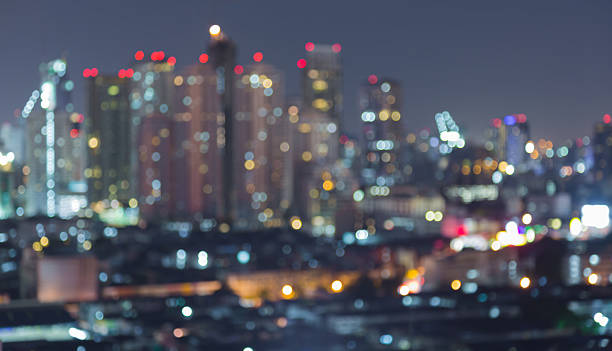 istock Office building light at night, abstract blurred bokeh 495578466