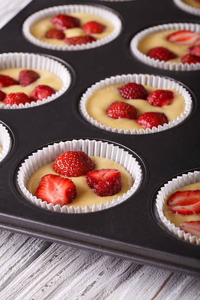istock raw strawberry muffins in baking dish macro 495579046