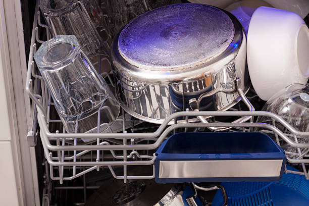 istock Dishwasher loades in a kitchen with clean dishes 495580898