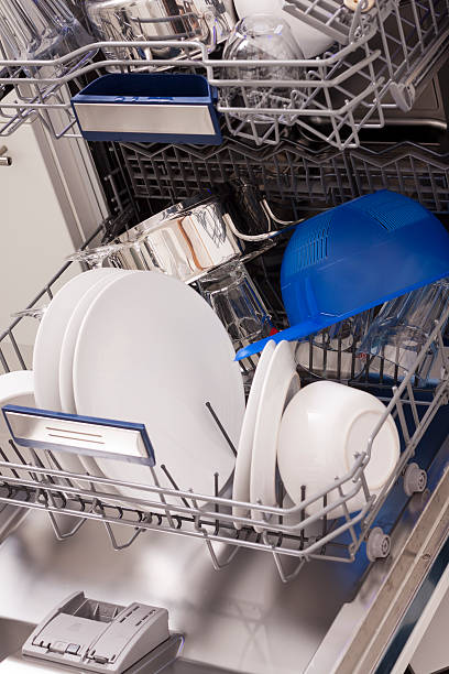 istock Dishwasher loades in a kitchen with clean dishes 495581042