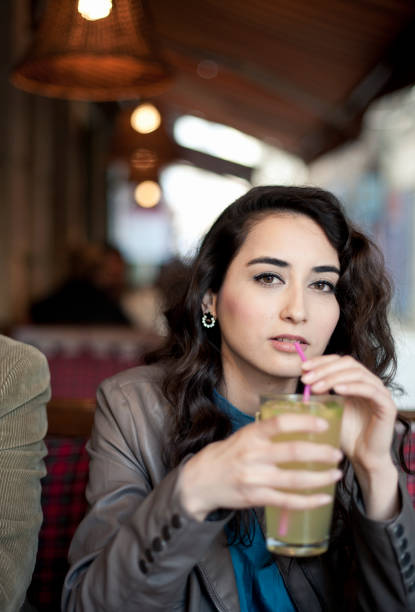 istock Young woman in a cafe. 495586375