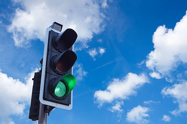 istock Green Traffic Light in the sky, freedom concept 495587099