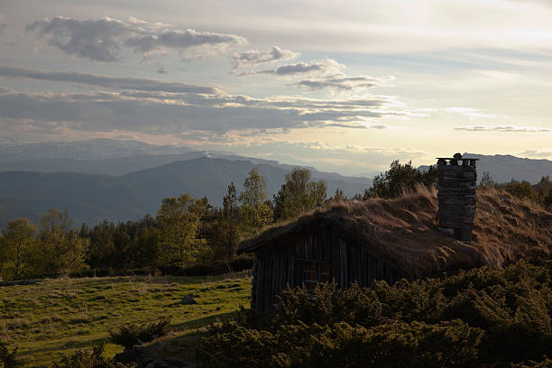 istock Summer farm in the Norwegian mountains at sunset. 495587359