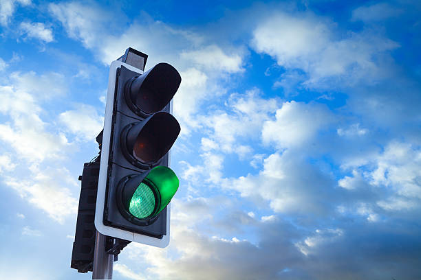 istock Green Traffic Light in the sky, freedom concept 495587493