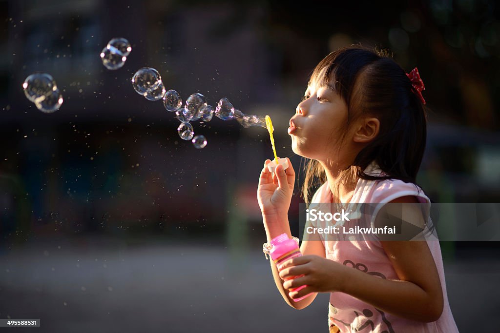 playing bubble wand file_thumbview_approve.php?size=3&id=41101340 Bubble Wand Stock Photo