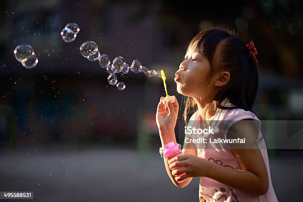 Playing Bubble Wand Stock Photo - Download Image Now - Bubble Wand, Child, Girls