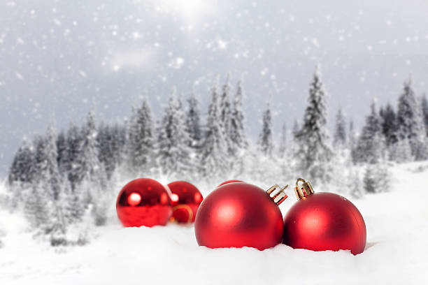 istock Christmas decorations and gift box in snow 495588850