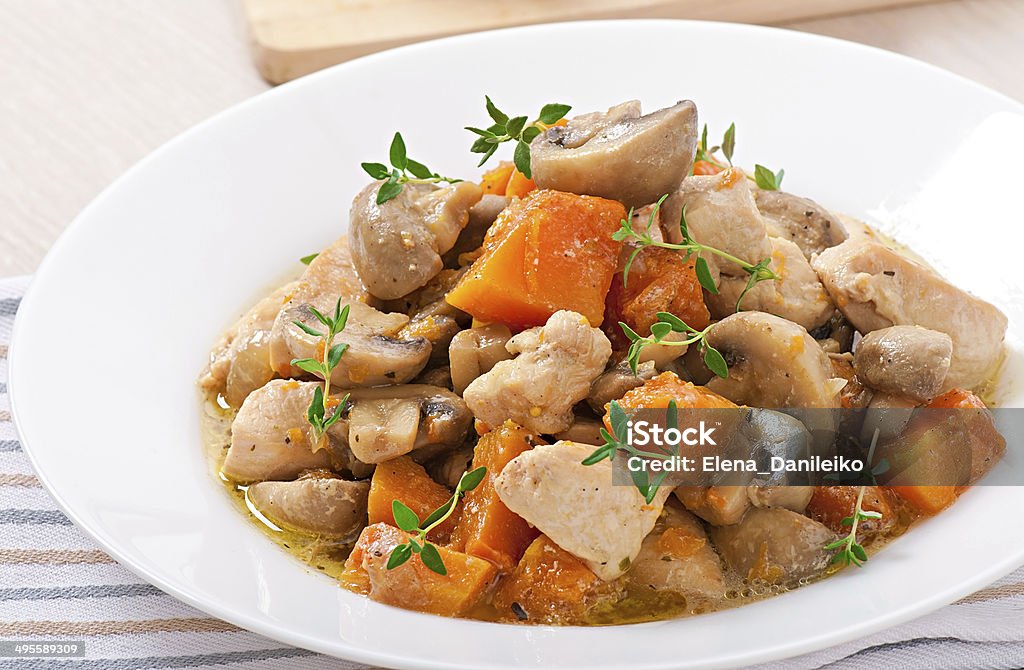 Stew chicken with vegetables and mushrooms in a cream sauce Appetizer Stock Photo