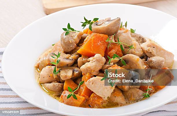 Stew Chicken With Vegetables And Mushrooms In A Cream Sauce Stock Photo - Download Image Now